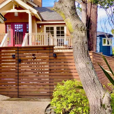 Wood gate in front of house
