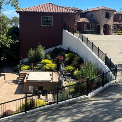 house on hill with driveway 