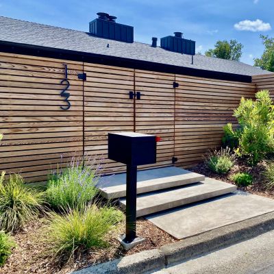 wood entry gate and landscaping