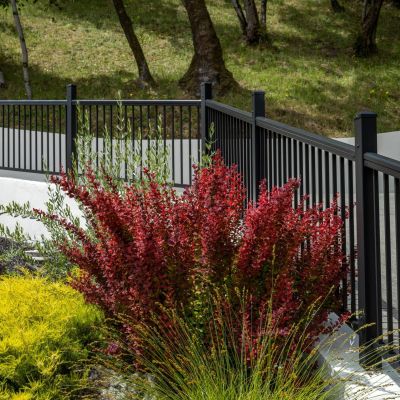 black picket driveway railing 